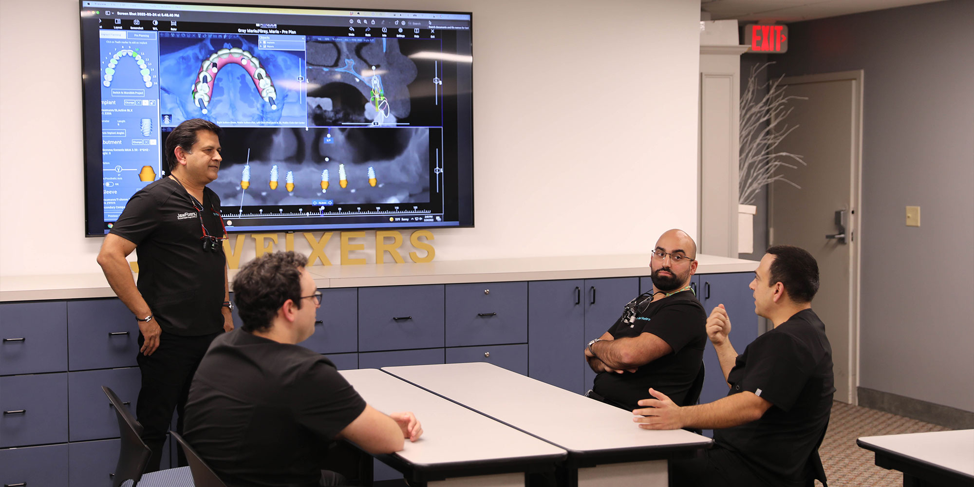 doctors all consulting over a patient's procedure