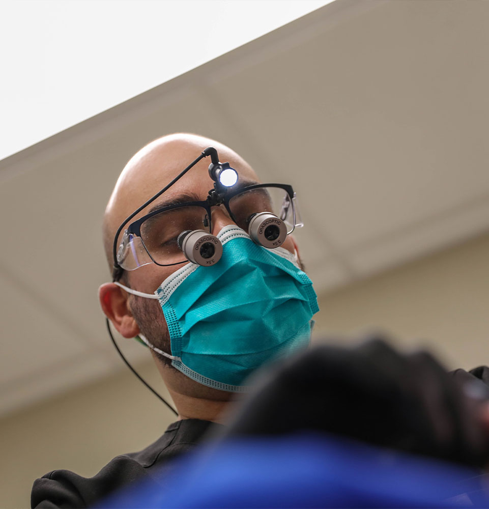 doctor performing a dental procedure